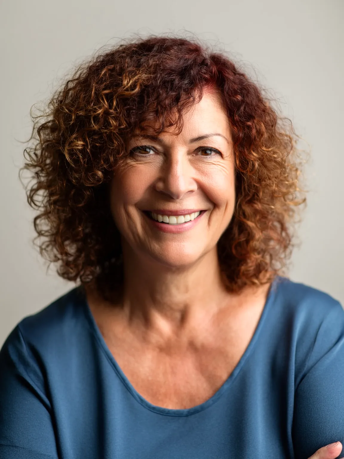 Voluminous Chin-Length Curls in Auburn Glow